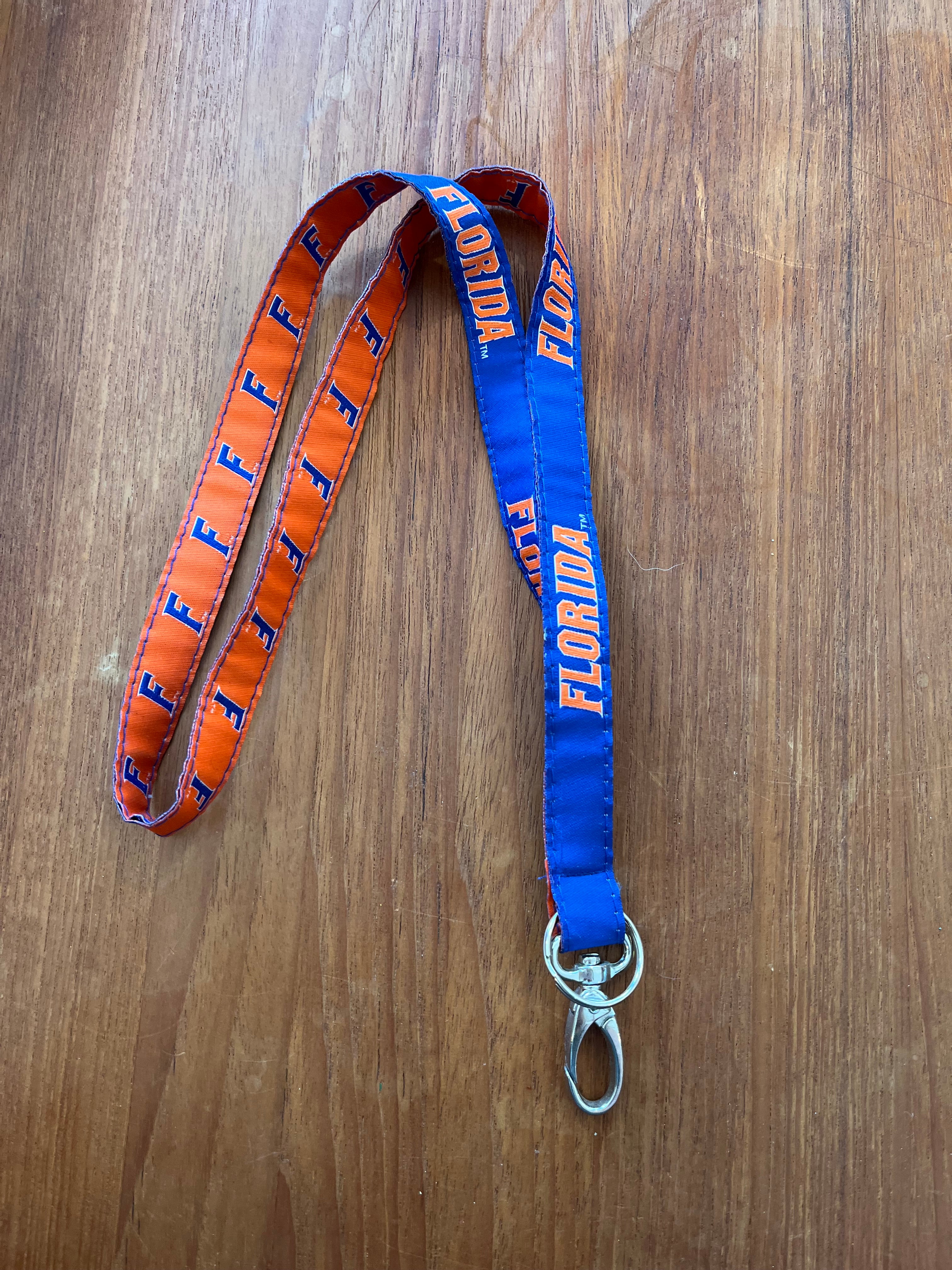 Reversible Florida Gators lanyard, orange with blue Fs and blue with orange Florida, swivel clip