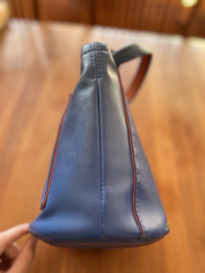Blue vinyl Gators purse, opposite side
