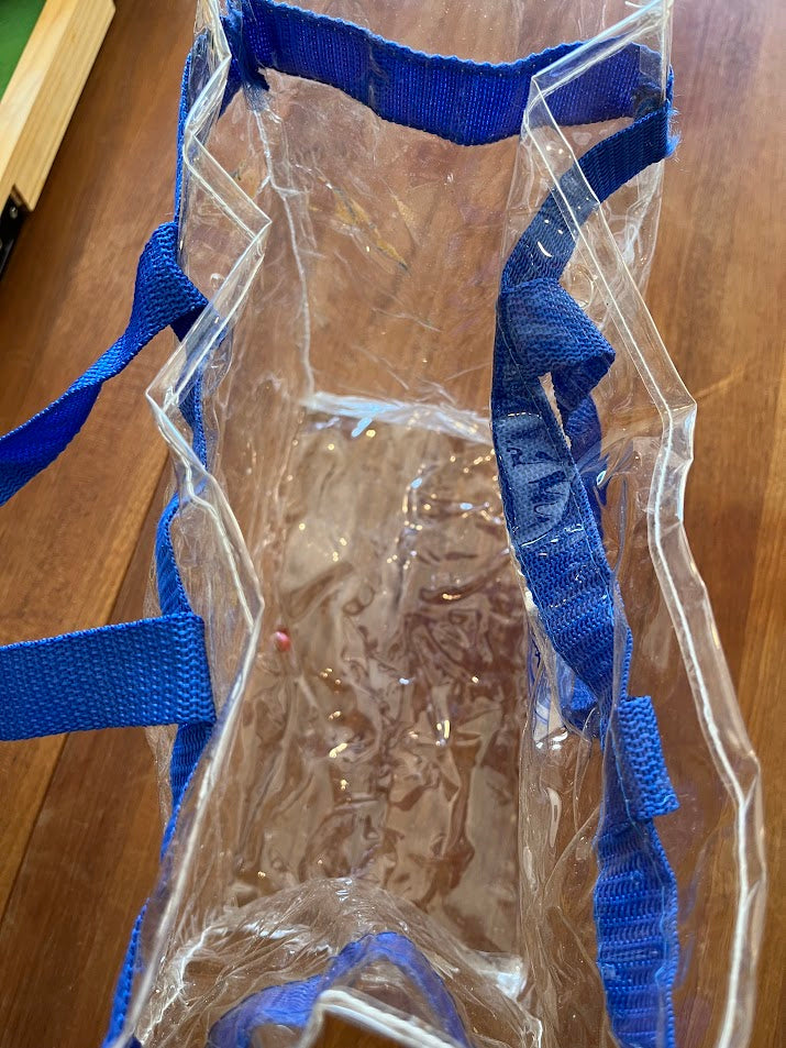 Inside clear Gator Boosters tote showing strap stitching