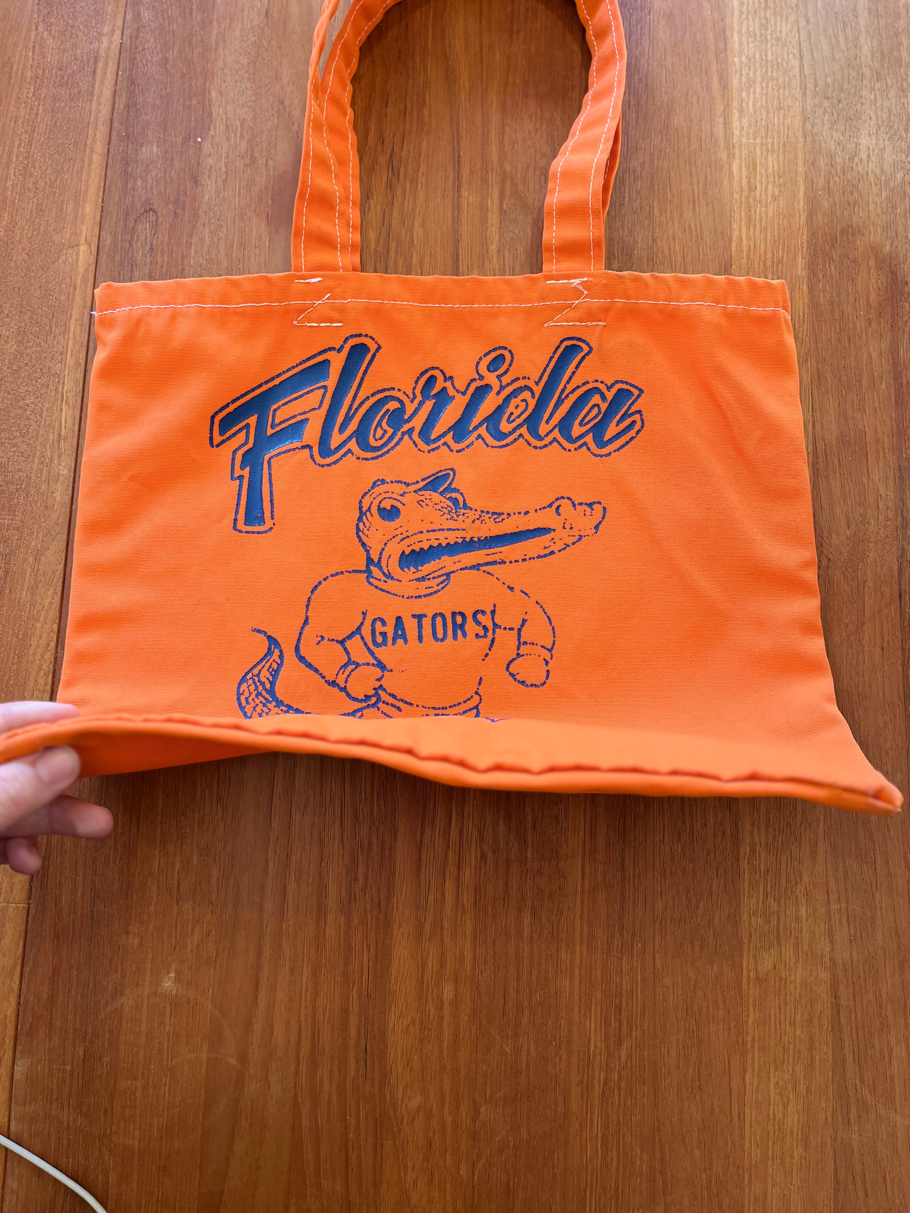 Orange Florida Gators tote laid flat, angled