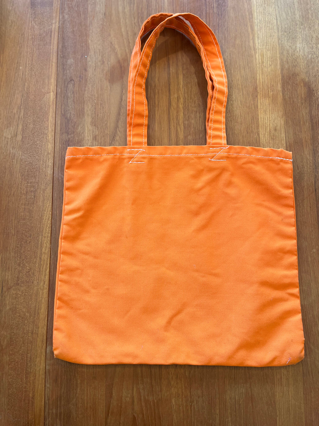 Plain back of orange Florida Gators tote