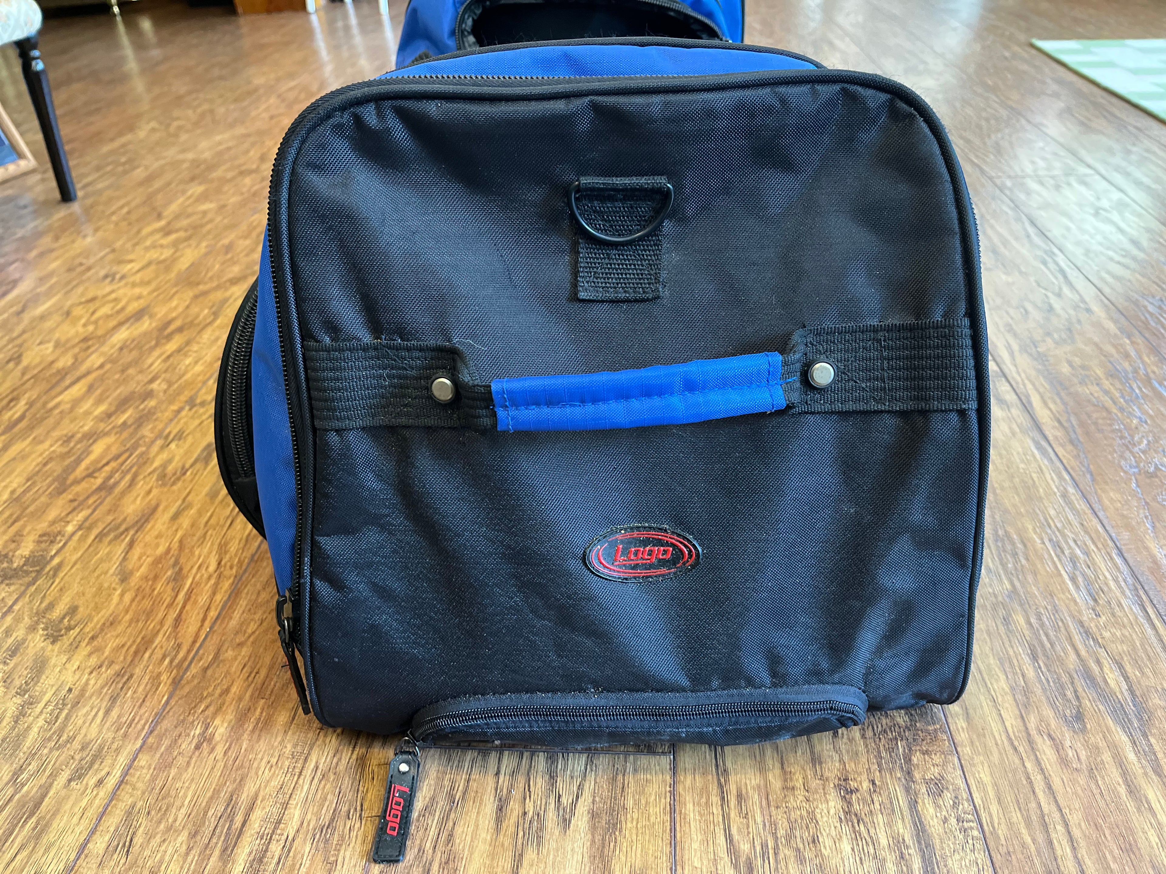 End of Gators rolling duffel with Logo Brands tag and padded handle