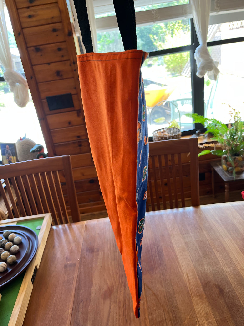 Gators print tote hanging, side view