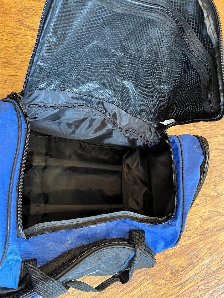 Inside Gators rolling duffel showing mesh pocket