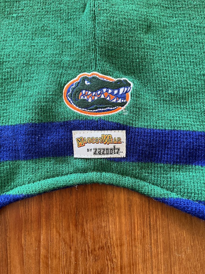 Close-up of gator-head patch and MascotWear by Zazootz tag